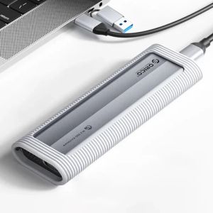 Cutie externă Orico pentru stocare pe disc - Carcasă - Cheie M.2 NVMe/SATA M/B - USB3.1 Type-C, Carcasă de protecție din silicon, 10Gbps - AXM2S-G2-GY-BP