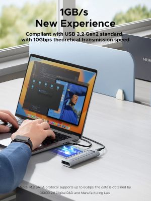 Cutie externă Orico pentru stocare pe disc - Carcasă - Cheie M.2 NVMe/SATA M/B - USB3.1 Type-C, Carcasă de protecție din silicon, 10Gbps - AXM2S-G2-GY-BP